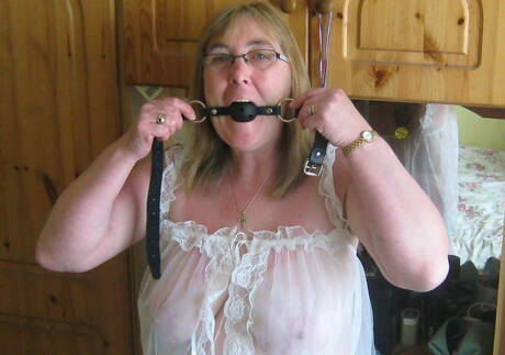 Fetish Shots offers a free photo gallery with randy teen in bizarre bdsm session